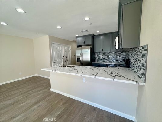 Interior, Kitchen, Recessed Lighting, Stainless Steel Appliances, Wood Texture Flooring