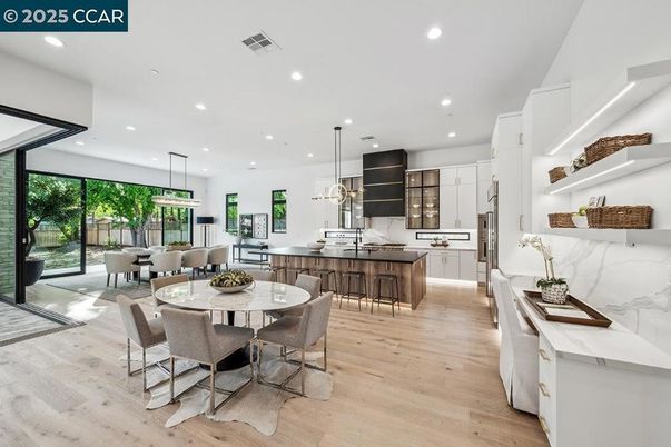Dining room, Interior, Kitchen, Pendant Lights, Recessed Lighting, Stainless Steel Appliances, Wood Texture Flooring