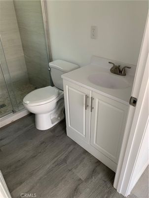 Bathroom, Glass Shower, Interior, Wood Texture Flooring