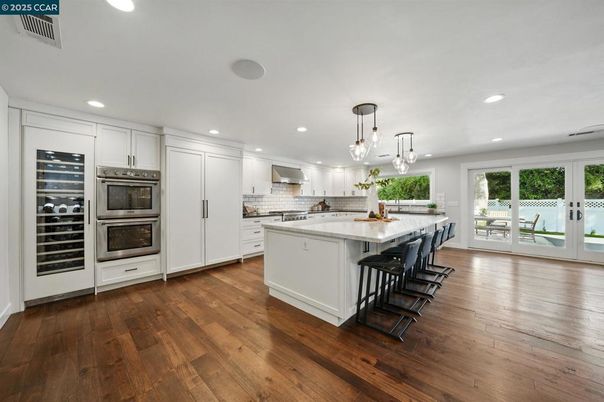 Interior, Kitchen, Pendant Lights, Recessed Lighting, Stainless Steel Appliances, Wood Texture Flooring