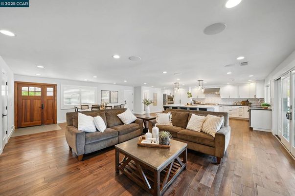 Dining room, Interior, Kitchen, Living room, Pendant Lights, Recessed Lighting, Stainless Steel Appliances, Wood Texture Flooring