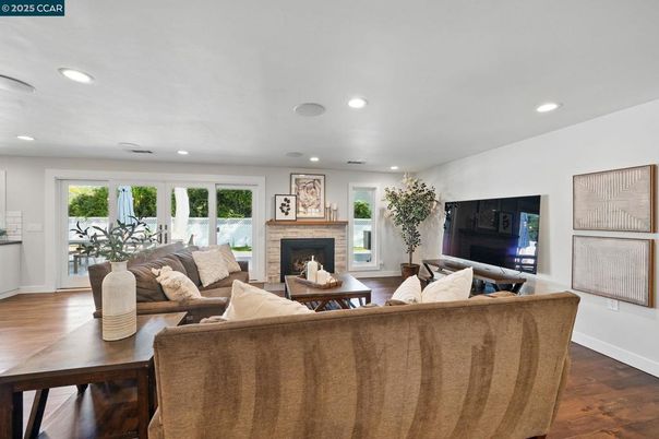 Fireplace, Interior, Living room, Recessed Lighting, Wood Texture Flooring