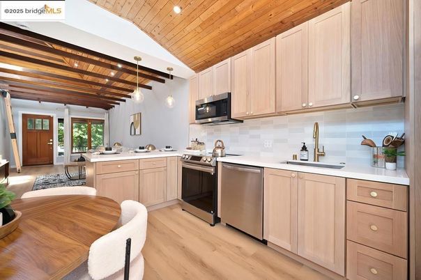Dining room, Interior, Kitchen, Pendant Lights, Recessed Lighting, Stainless Steel Appliances, Wooden Beams, Wooden Ceilings, Wood Texture Flooring