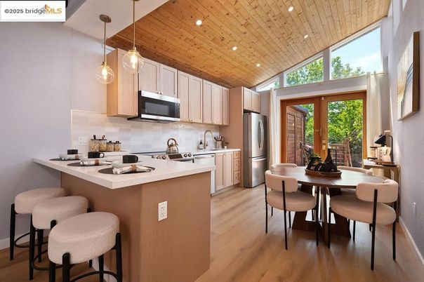 Dining room, Interior, Kitchen, Pendant Lights, Recessed Lighting, Stainless Steel Appliances, Wooden Ceilings, Wood Texture Flooring