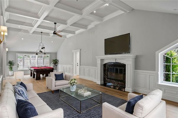 Billiard Table, Fireplace, Game Room, Interior, Living room, Pendant Lights, Recessed Lighting, Wood Texture Flooring