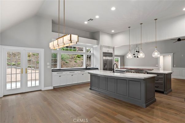 Chandelier, Interior, Kitchen, Pendant Lights, Recessed Lighting, Stainless Steel Appliances, Wood Texture Flooring