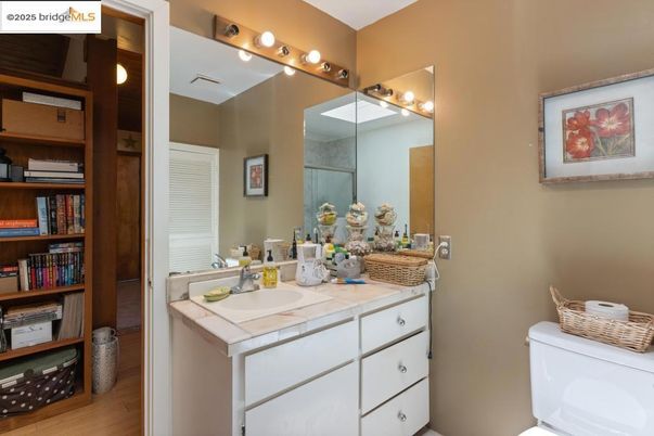 Bathroom, Dual Sink Vanities, Interior, Tile Countertops, Wood Texture Flooring