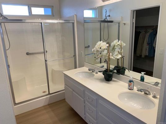Bathroom, Dual Sink Vanities, Glass Shower, Interior, Walk-in Closets, Wood Texture Flooring