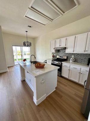 Interior, Kitchen, Pendant Lights, Stainless Steel Appliances, Wood Texture Flooring