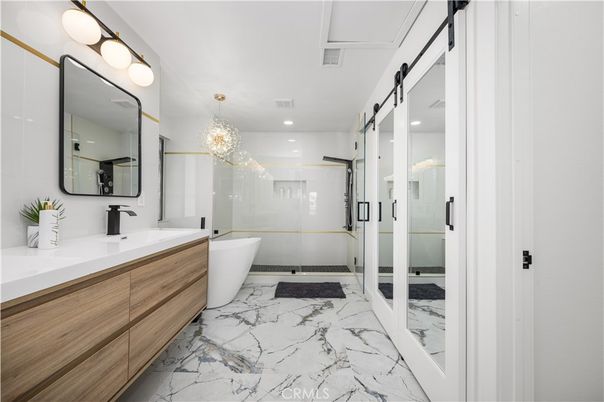 Bathroom, Chandelier, Dual Sink Vanities, Free Standing Baths, Glass Shower, Interior, Marble, Recessed Lighting