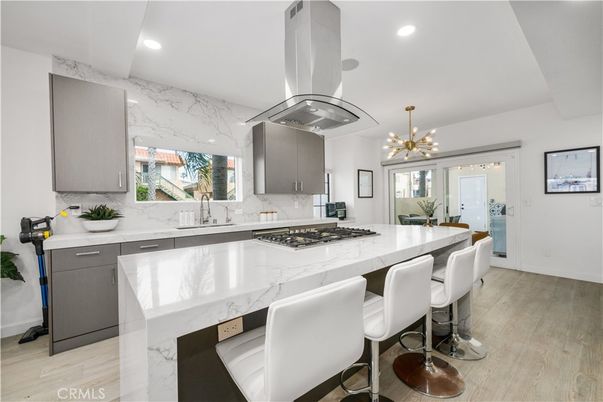Interior, Kitchen, Marble Walls, Pendant Lights, Recessed Lighting, Wood Texture Flooring