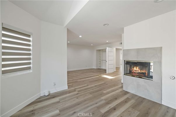 Empty room, Fireplace, Interior, Recessed Lighting, Wood Texture Flooring