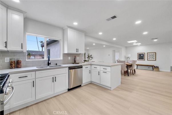 Dining room, Interior, Kitchen, Recessed Lighting, Stainless Steel Appliances, Wood Texture Flooring