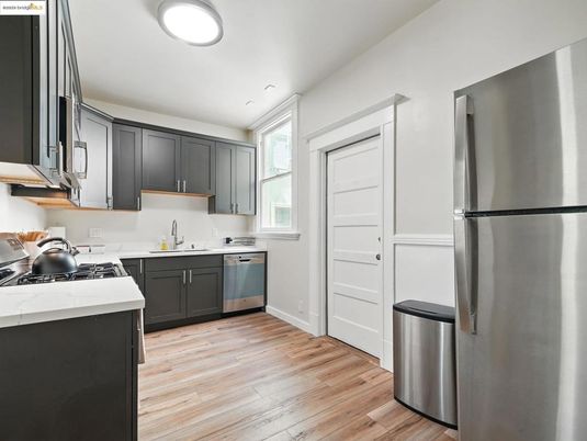 Interior, Kitchen, Recessed Lighting, Stainless Steel Appliances, Wood Texture Flooring