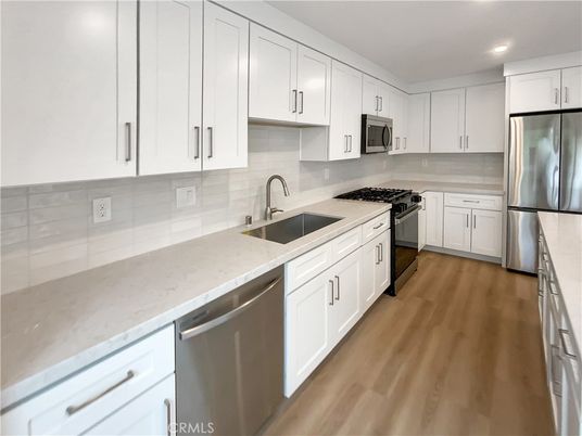 Interior, Kitchen, Recessed Lighting, Stainless Steel Appliances, Wood Texture Flooring