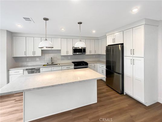 Interior, Kitchen, Pendant Lights, Recessed Lighting, Stainless Steel Appliances, Wood Texture Flooring