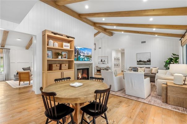 Dining room, Fireplace, Interior, Living room, Recessed Lighting, Wooden Beams, Wood Texture Flooring