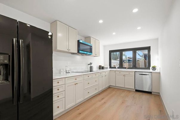 Interior, Kitchen, Recessed Lighting, Stainless Steel Appliances, Wood Texture Flooring