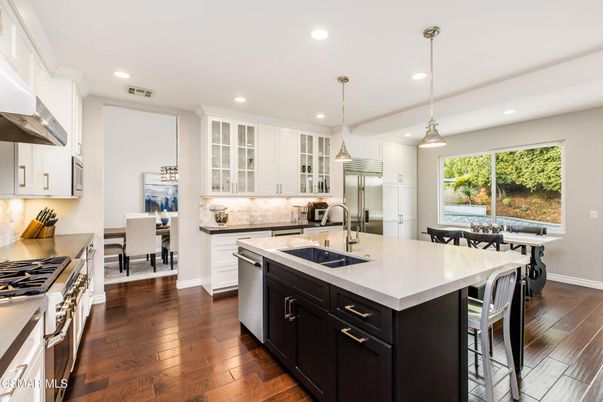 Dining room, Interior, Kitchen, Pendant Lights, Recessed Lighting, Stainless Steel Appliances, Wood Texture Flooring