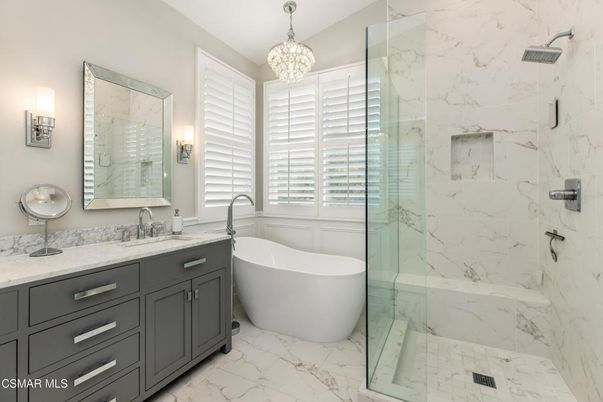 Bathroom, Chandelier, Dual Sink Vanities, Free Standing Baths, Glass Shower, Interior, Marble, Marble Walls, Pendant Lights