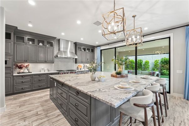 Chandelier, Interior, Kitchen, Pendant Lights, Recessed Lighting, Stainless Steel Appliances, Wood Texture Flooring
