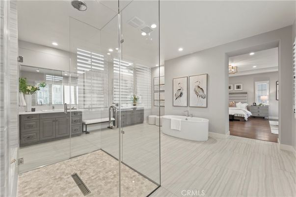 Bathroom, Bedroom, Dual Sink Vanities, Free Standing Baths, Glass Shower, Interior, Recessed Lighting, Wood Texture Flooring