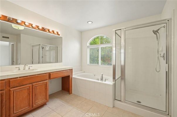 Bathroom, Dual Sink Vanities, Glass Shower, Interior, Recessed Lighting, Tile Countertops