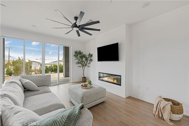 Fireplace, Interior, Living room, Recessed Lighting, Wood Texture Flooring