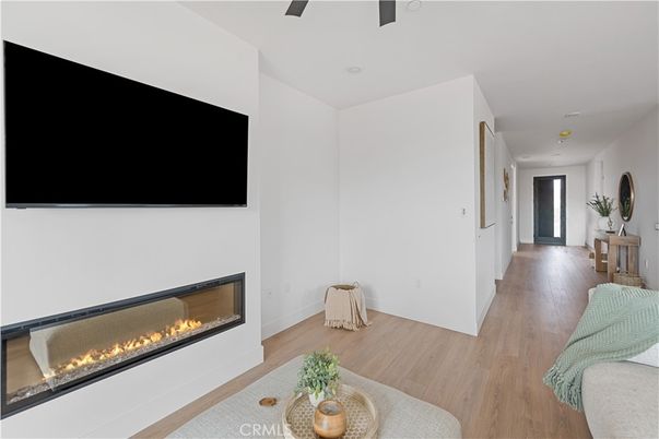 Fireplace, Interior, Recessed Lighting, Wood Texture Flooring