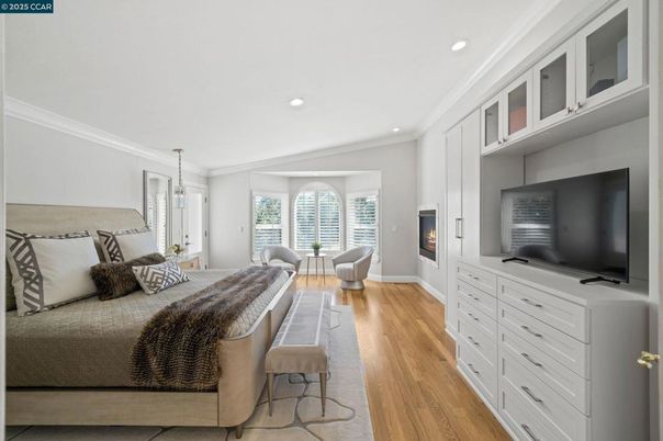 Bedroom, Fireplace, Interior, Living room, Pendant Lights, Recessed Lighting, Wood Texture Flooring