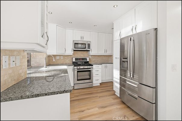 Interior, Kitchen, Recessed Lighting, Stainless Steel Appliances, Wood Texture Flooring