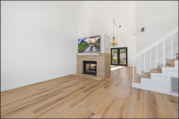 Chandelier, Empty room, Fireplace, Interior, Wood Texture Flooring