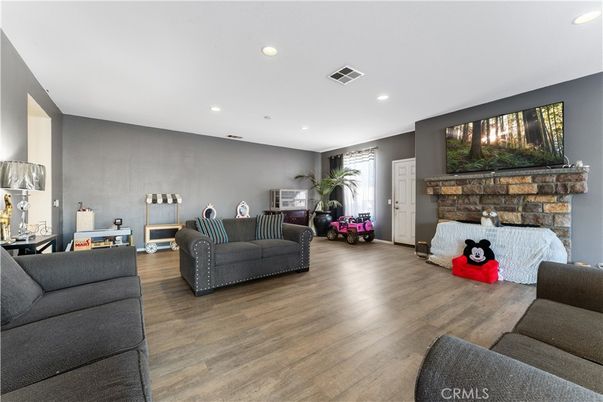 Fireplace, Interior, Living room, Recessed Lighting, Wood Texture Flooring