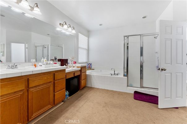Bathroom, Dual Sink Vanities, Glass Shower, Interior, Recessed Lighting, Tile Countertops