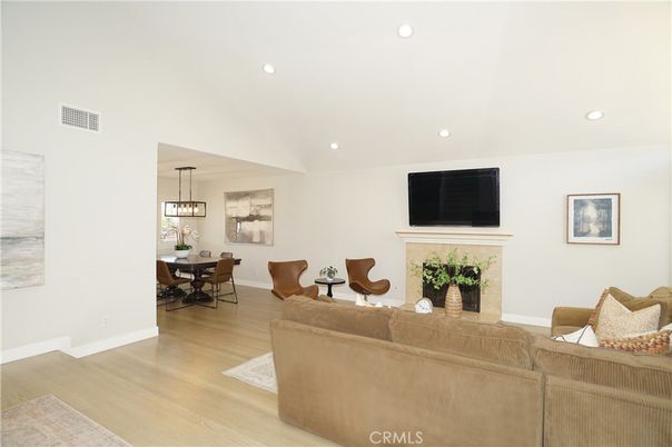 Dining room, Fireplace, Interior, Living room, Pendant Lights, Recessed Lighting, Wood Texture Flooring