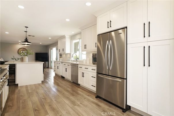 Dining room, Interior, Kitchen, Pendant Lights, Recessed Lighting, Stainless Steel Appliances, Wood Texture Flooring