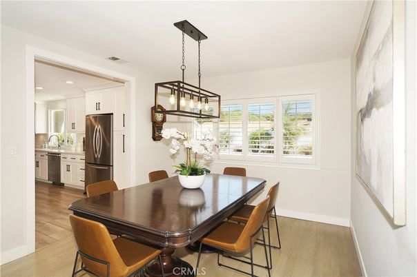 Dining room, Interior, Kitchen, Pendant Lights, Recessed Lighting, Stainless Steel Appliances, Wood Texture Flooring