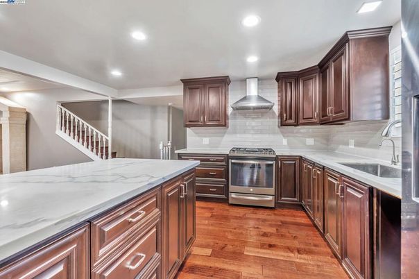 Interior, Kitchen, Recessed Lighting, Stainless Steel Appliances, Wood Texture Flooring
