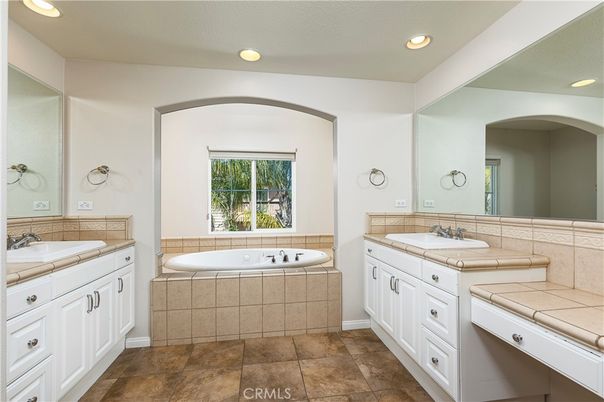 Bathroom, Dual Sink Vanities, Interior, Recessed Lighting, Tile Countertops
