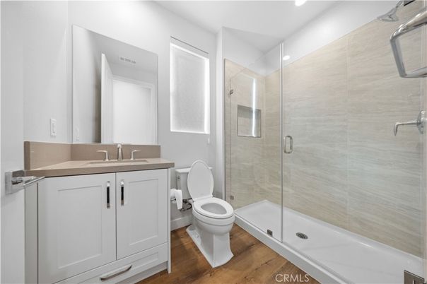 Bathroom, Glass Shower, Interior, Recessed Lighting, Wood Texture Flooring