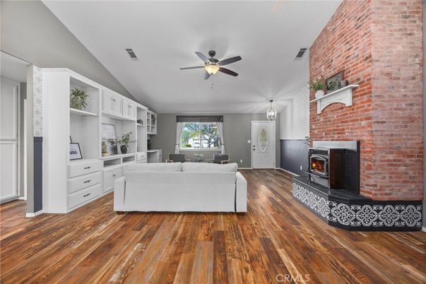 Fireplace, Interior, Living room, Pendant Lights, Stone Walls, Wood Texture Flooring