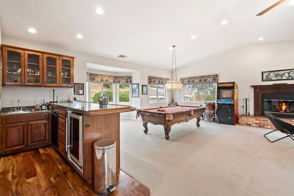 Billiard Table, Fireplace, Game Room, Interior, Pendant Lights, Recessed Lighting, Wood Texture Flooring