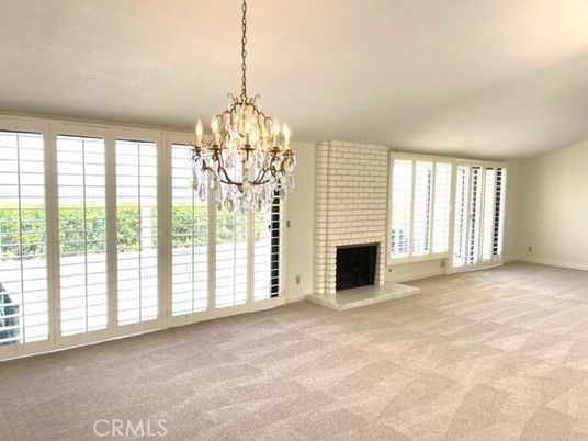 Chandelier, Empty room, Fireplace, Interior