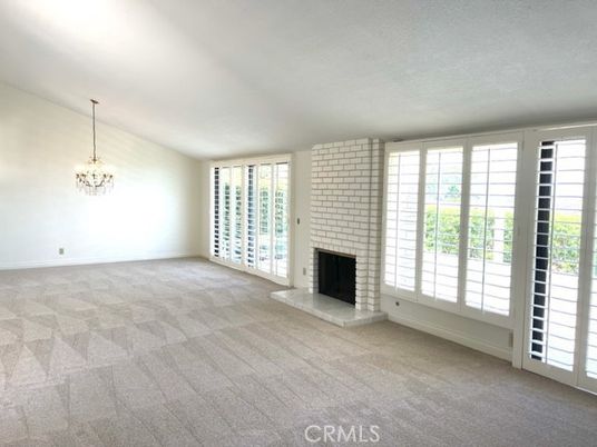 Chandelier, Empty room, Fireplace, Interior