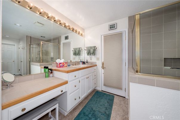 Bathroom, Dual Sink Vanities, Glass Shower, Interior, Recessed Lighting, Tile Countertops