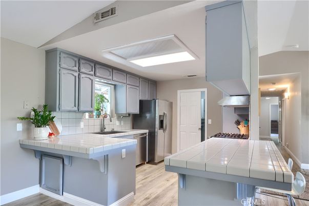 Interior, Kitchen, Tile Countertops, Wood Texture Flooring