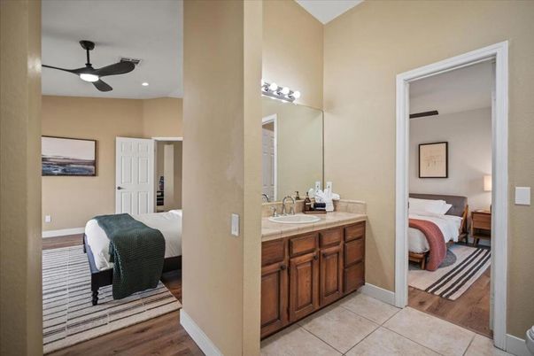 Bathroom, Bedroom, Interior, Recessed Lighting, Tile Countertops, Wood Texture Flooring