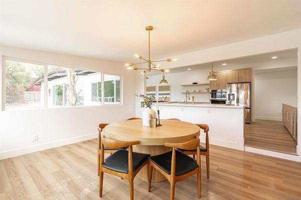 Dining room, Interior, Kitchen, Pendant Lights, Recessed Lighting, Stainless Steel Appliances, Wood Texture Flooring