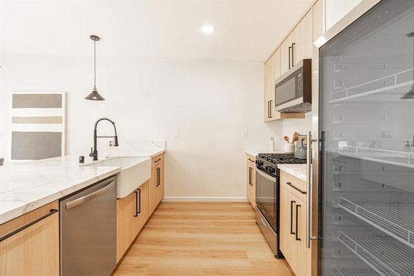 Interior, Kitchen, Pendant Lights, Recessed Lighting, Stainless Steel Appliances, Wood Texture Flooring