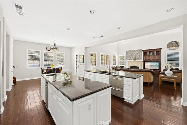 Chandelier, Dining room, Interior, Kitchen, Living room, Recessed Lighting, Wood Texture Flooring